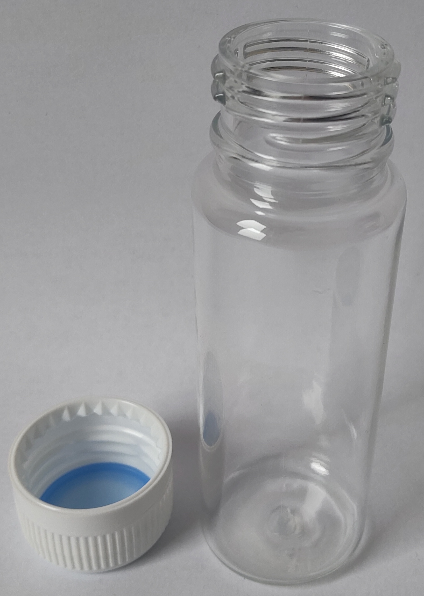 STEZA - Plastová průhledná lahvička 60 ml. (Čírá plastová lahvička z uzávěrem)