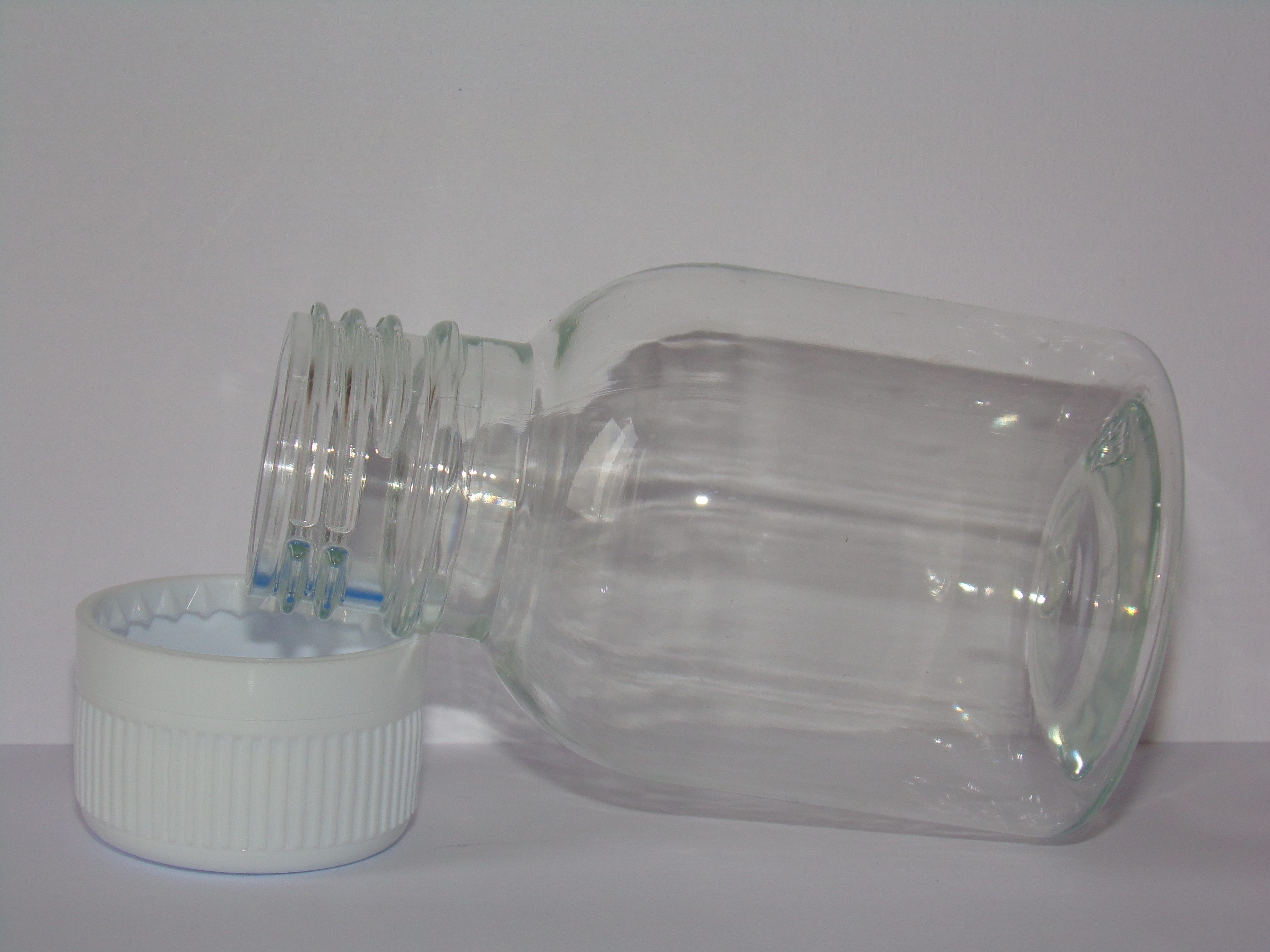 STEZA - Plastová průhledná lahvička 50 ml. Na tobolky i koření